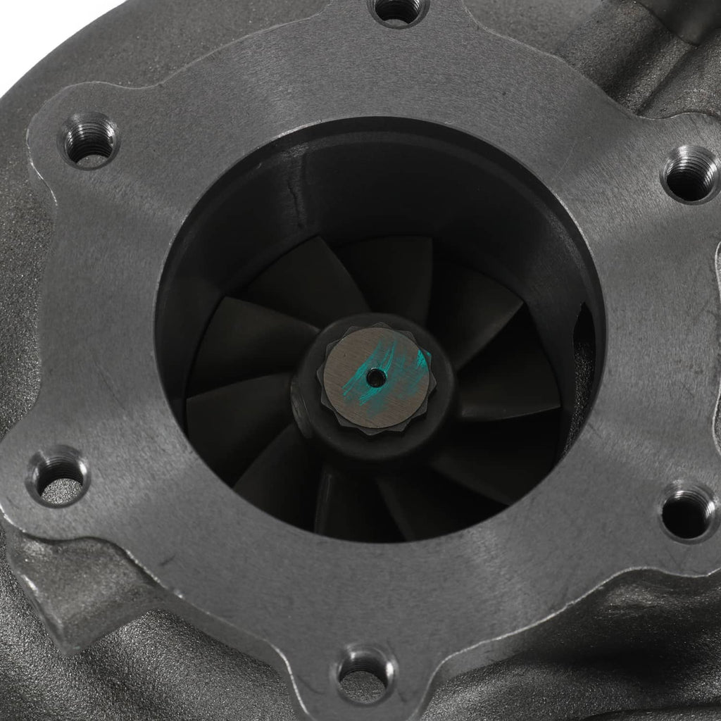 Turbocharger compressor inlet close-up with dark wheel blades