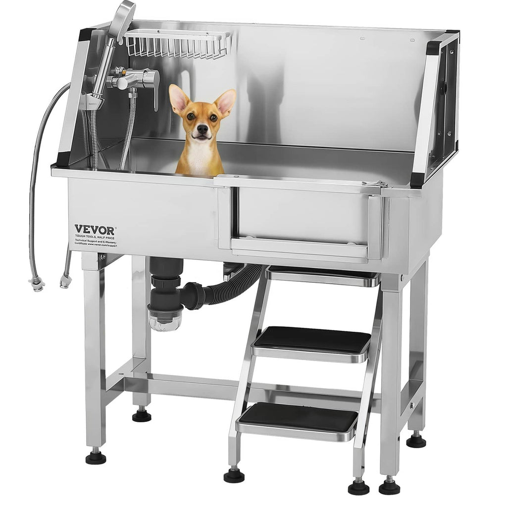 Stainless steel pet grooming tub with front faucet, wire basket, and two-step stairs