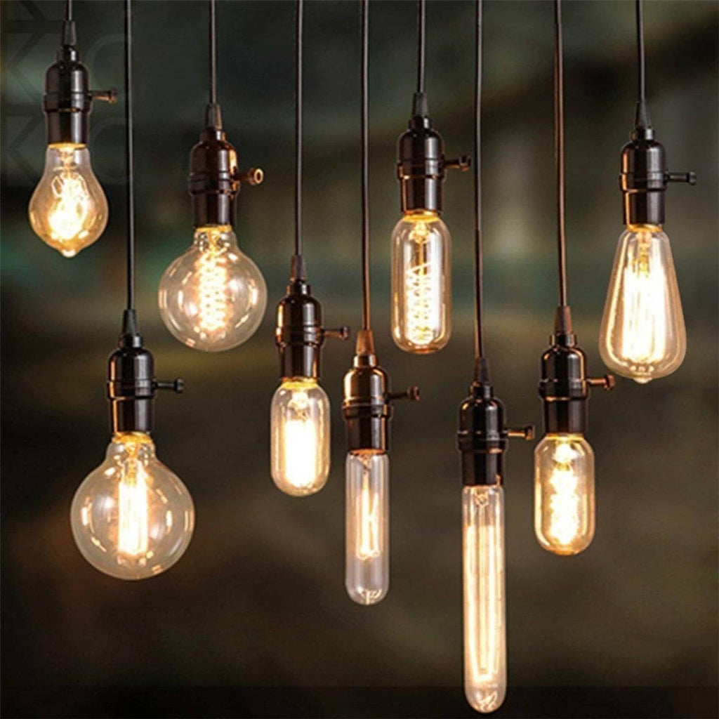 Vintage C35 LED chandelier bulbs with flame filaments and E14 bases in a hanging set.