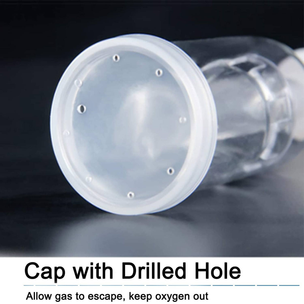 Clear airlock cap with drilled hole for gas release