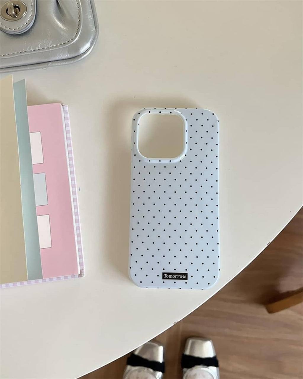 Light blue dotted iPhone 13 Pro case with large top camera cutout