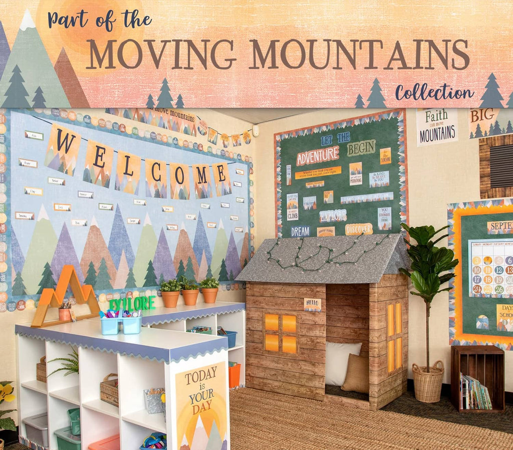 Mountain-themed classroom magnetic whiteboard display with “Moving Mountains” heading