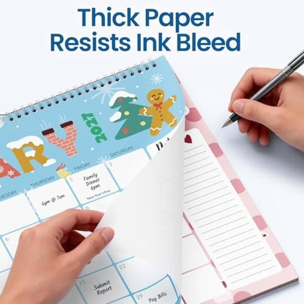 Thick-paper 18-month wall calendar page with lined notes and pen writing