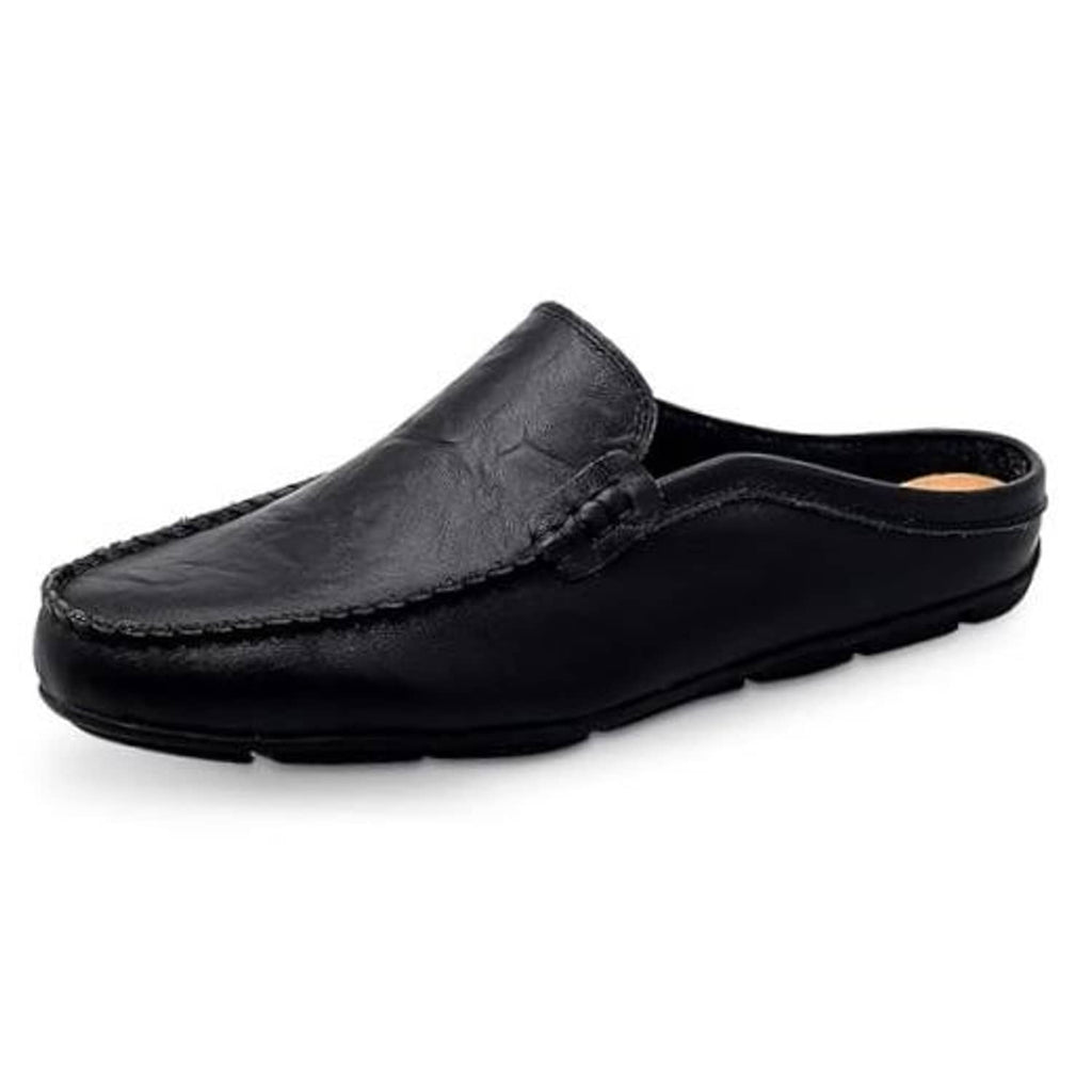 Black leather slip-on mule clog slippers, rounded toe with stitched moc detail and strap