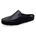 Black leather slip-on mule clog slippers, rounded toe with stitched moc detail and strap