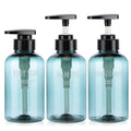 Set of three teal refillable soap dispenser bottles with black pump tops