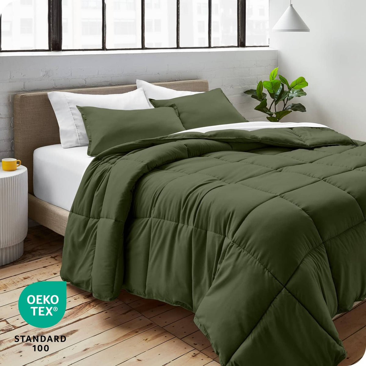 Cypress green down alternative comforter set with two pillow shams on full bed