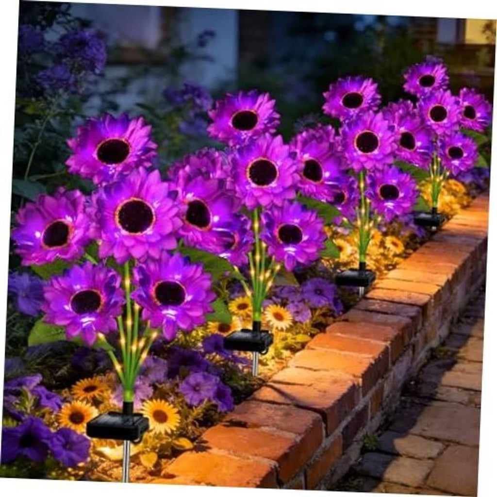 Purple solar sunflower garden lights with glowing purple blooms and black stake bases