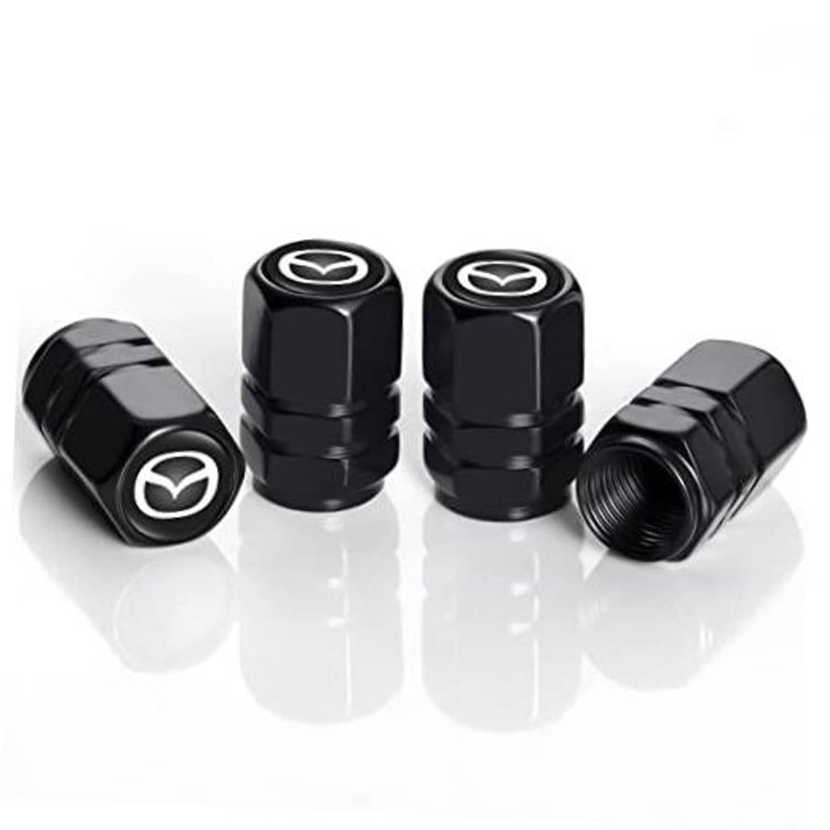 Set of four black metal tire valve stem caps with Mazda emblem, side view