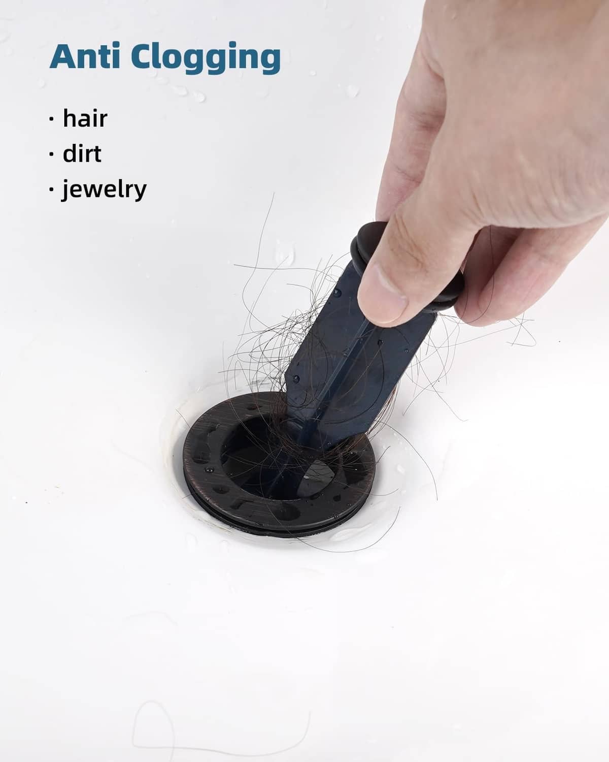 Bathroom sink drain stopper, hand lifting dark cover to reduce clogs