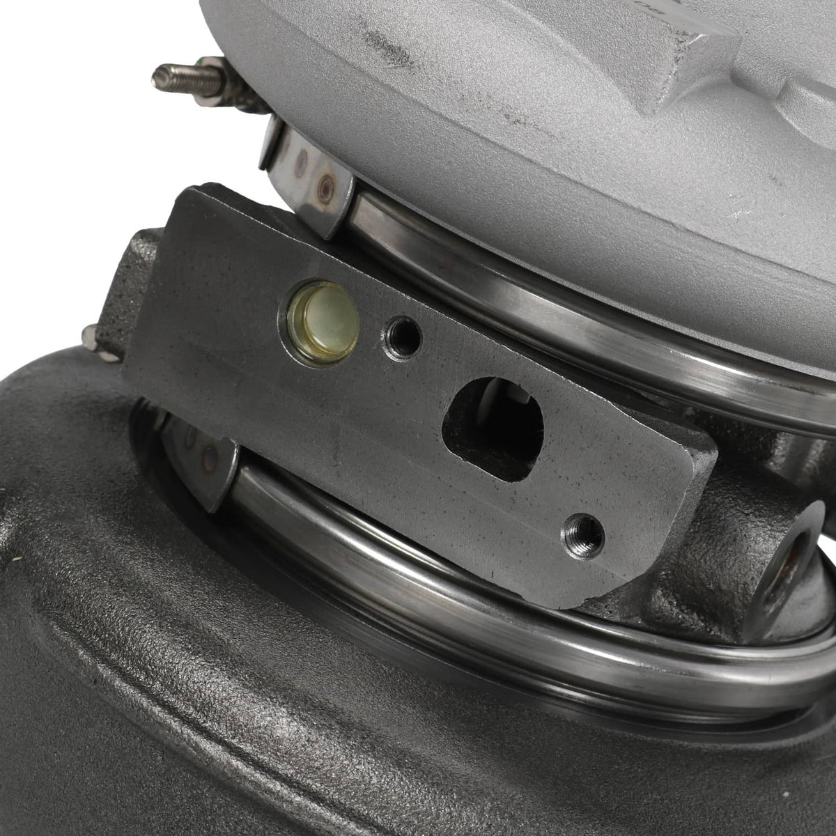 Turbocharger bearing housing ring with mounting bolts and gold-colored cap