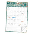 Floral wall calendar showing July 2026, with daily planning grid and hanging wire top