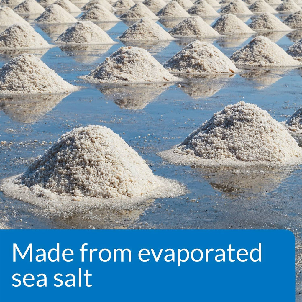 Aquarium salt crystals in mounds with blue callout text: Made from evaporated sea salt