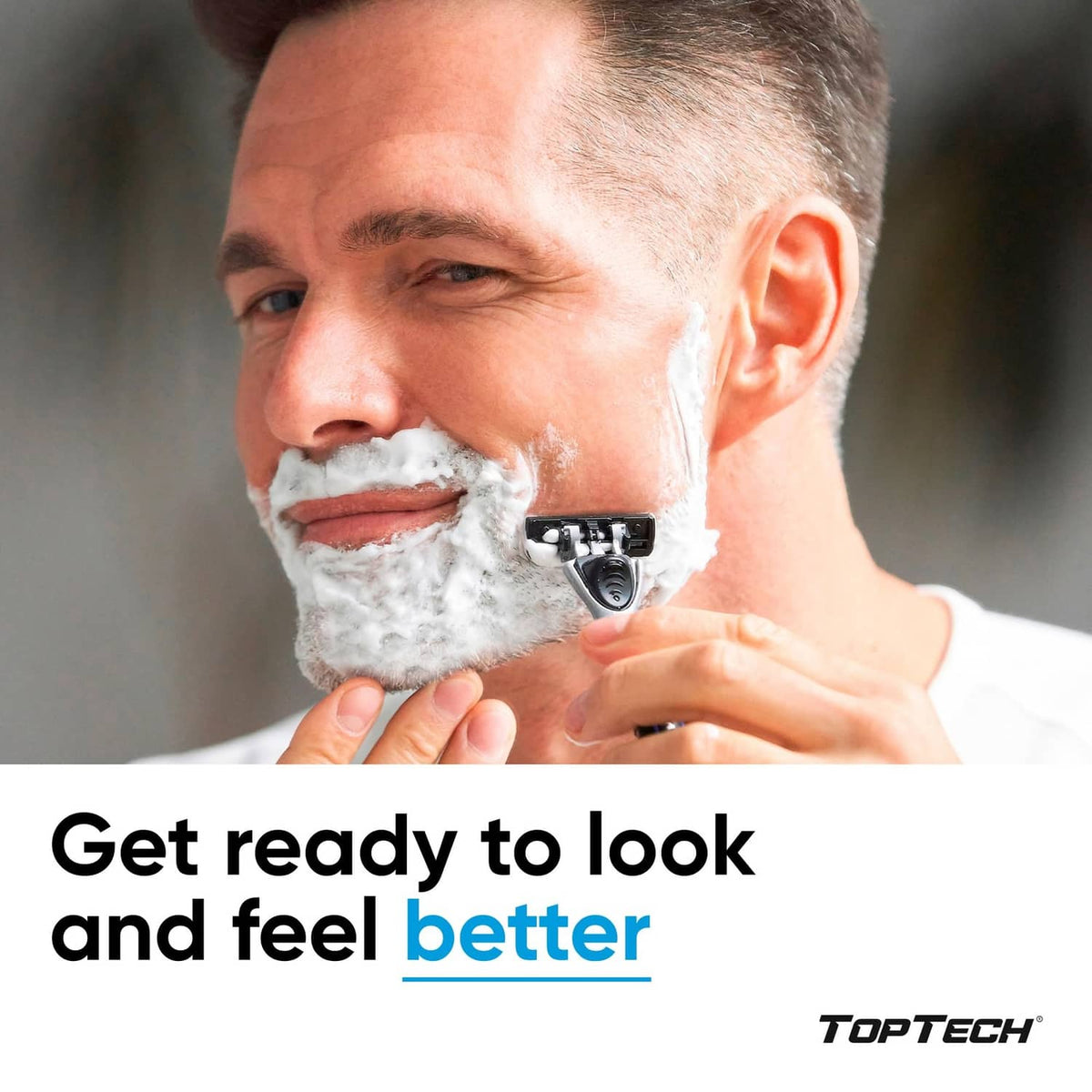 Men's razor shaving handle with white lather, close-up shaving at cheek