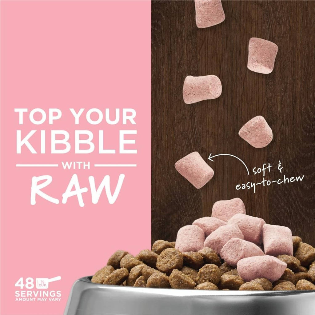 Dog food topper bowl with brown kibble topped with pink, soft easy-to-chew bites
