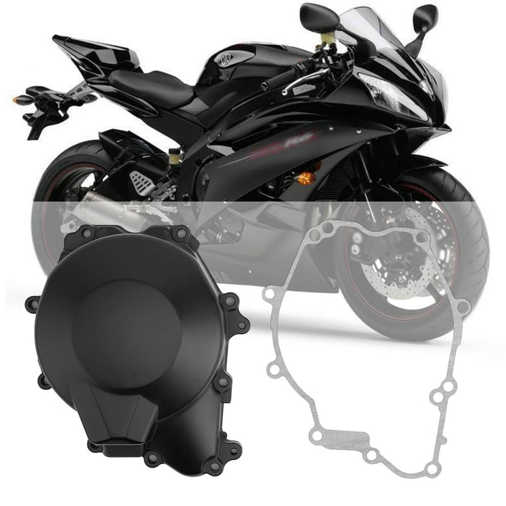 Left engine crankcase stator cover with gasket, black aluminum, close-up view