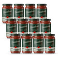 Pack of tomato paste jars with green caps, red labels, and stacked rows