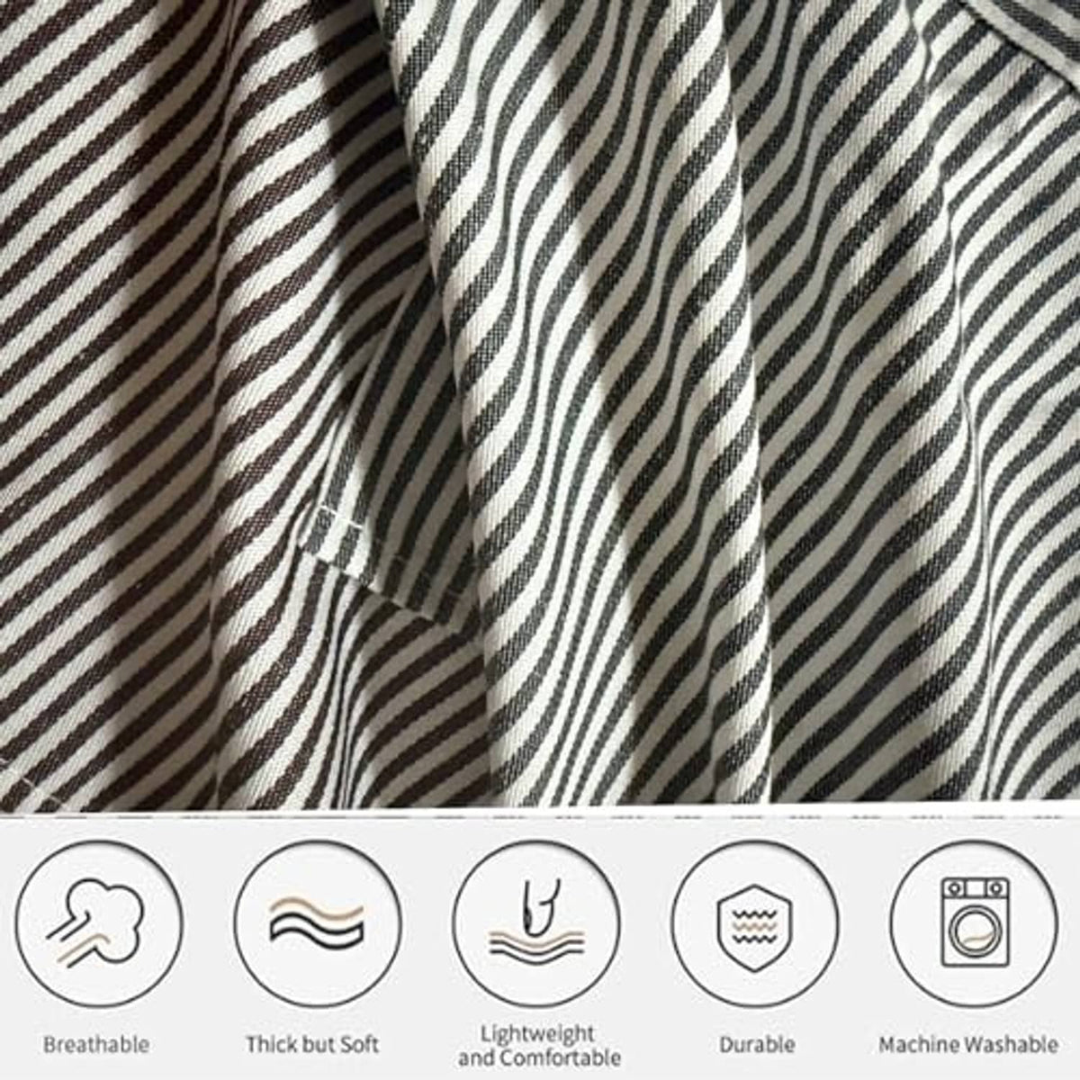 Black-and-white vertical striped apron fabric with black trim and stitched seam details
