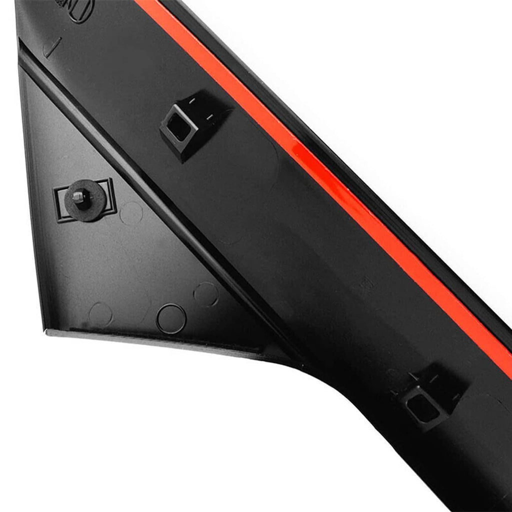 Close-up of black windshield pillar trim molding with red stripe and clips