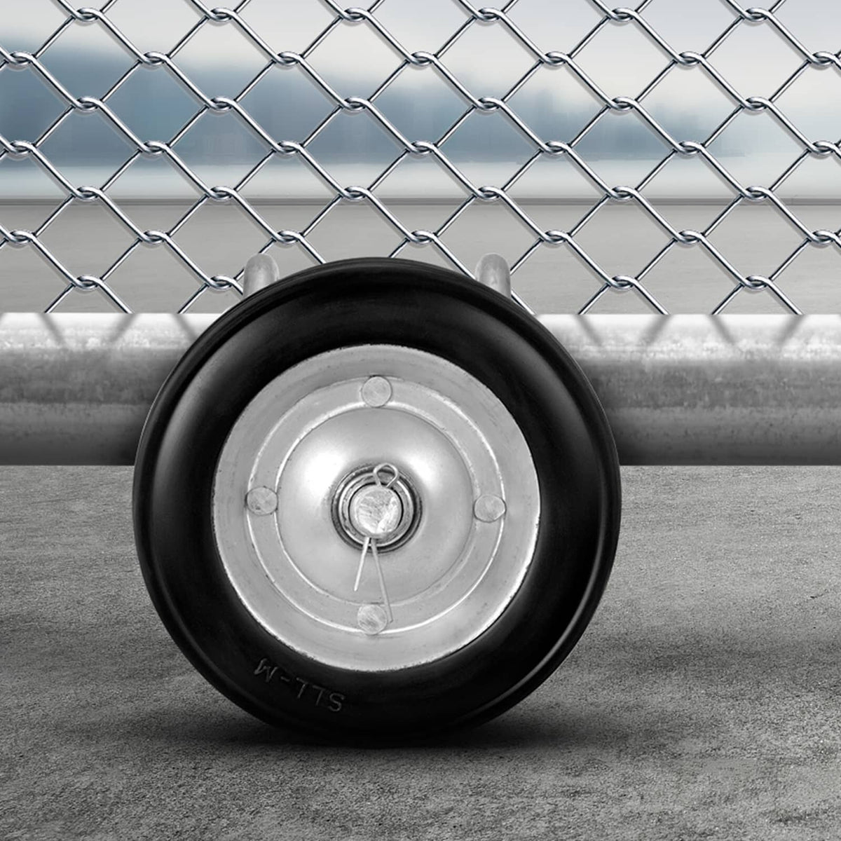 Sliding gate caster wheel with black rubber tire and silver metal hub