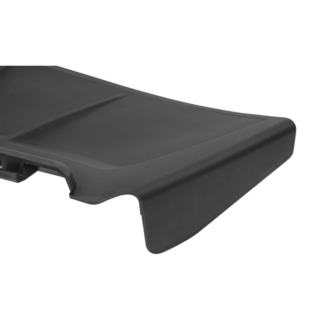 Black discharge chute with flared outlet edge and molded underside contour