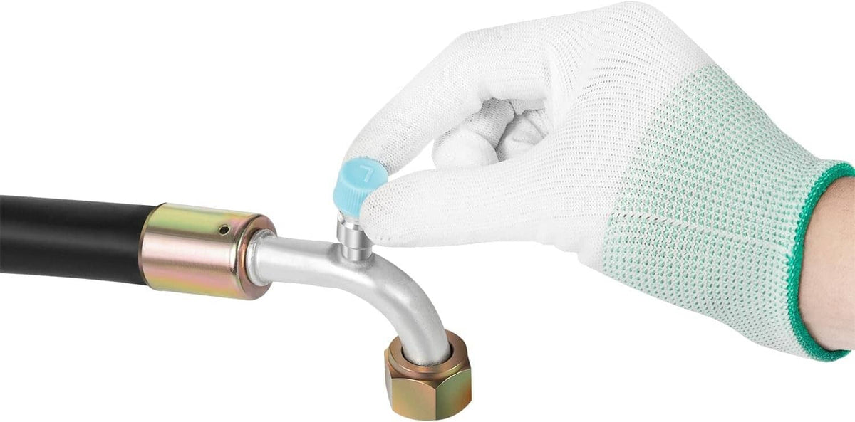 Hand installing an A/C hose connector onto a black hose with O-ring seal