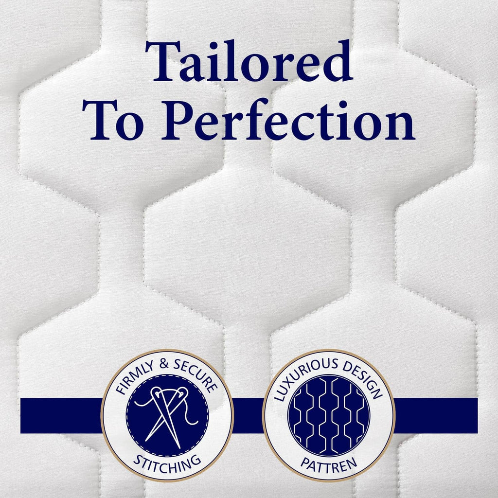 White quilted mattress pad with hexagon channel stitching detail