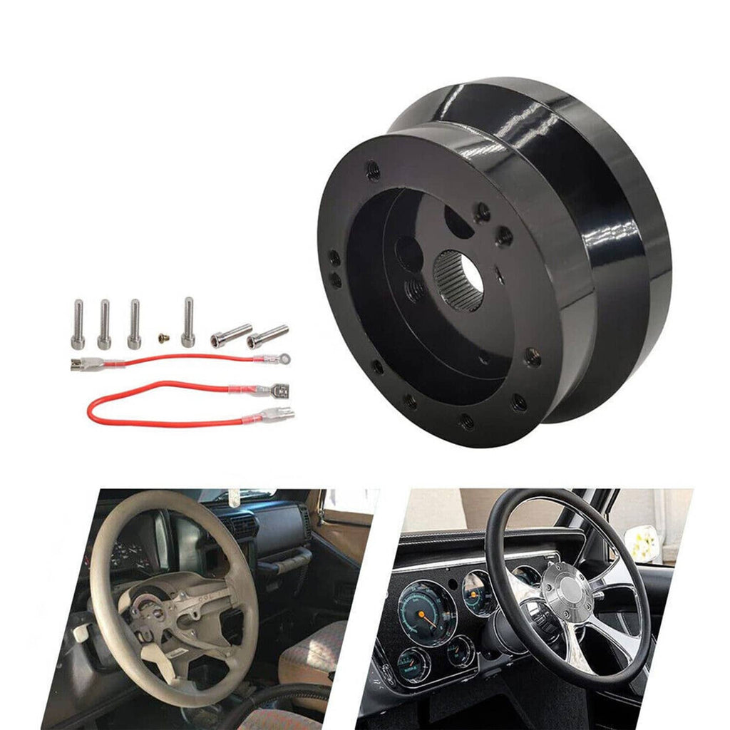 Black steering wheel hub adapter with bolt holes and wiring harness kit