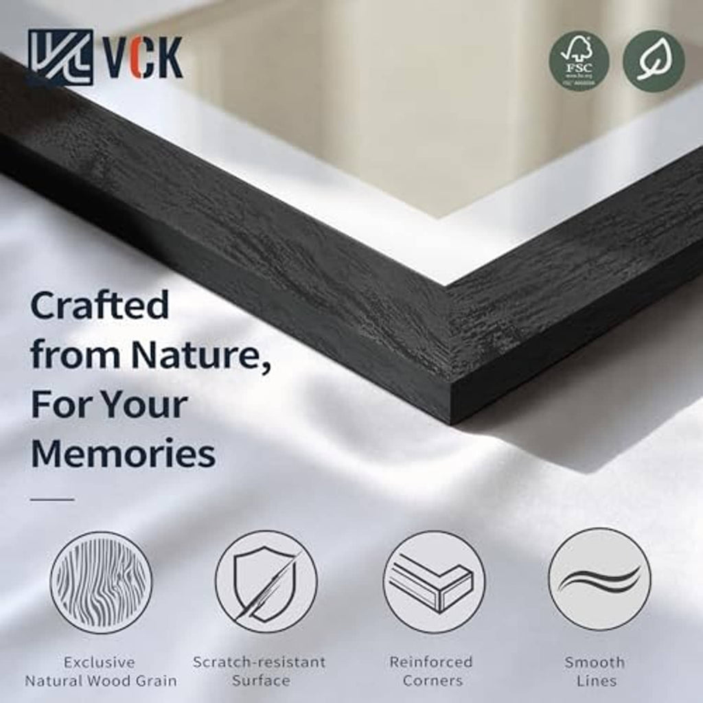 Close-up of black wood picture frame corner with textured grain detail