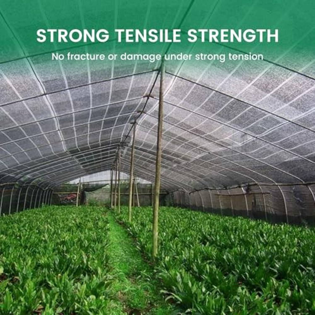 Greenhouse shade cloth stretched over tunnel frame with dark woven mesh