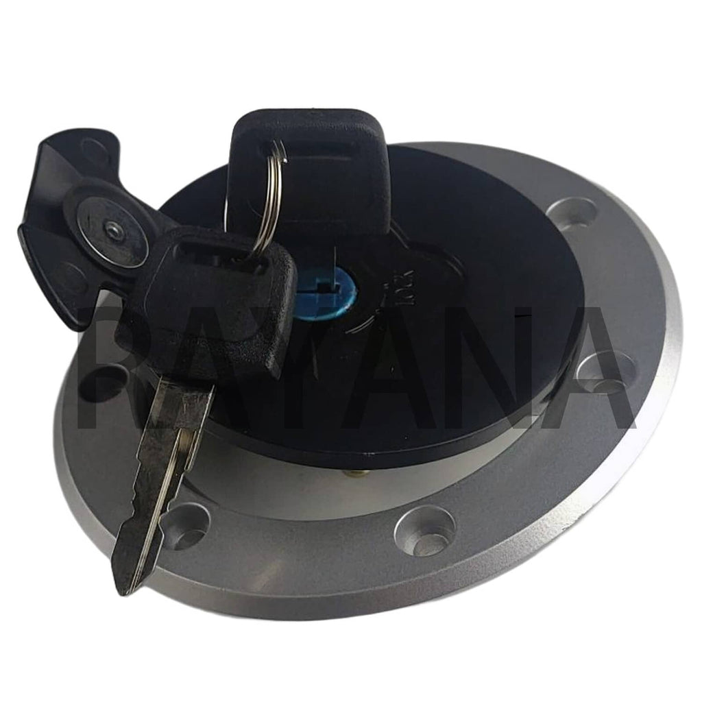 Fuel tank gas cap with keys inserted and black lock housing, angled close-up.