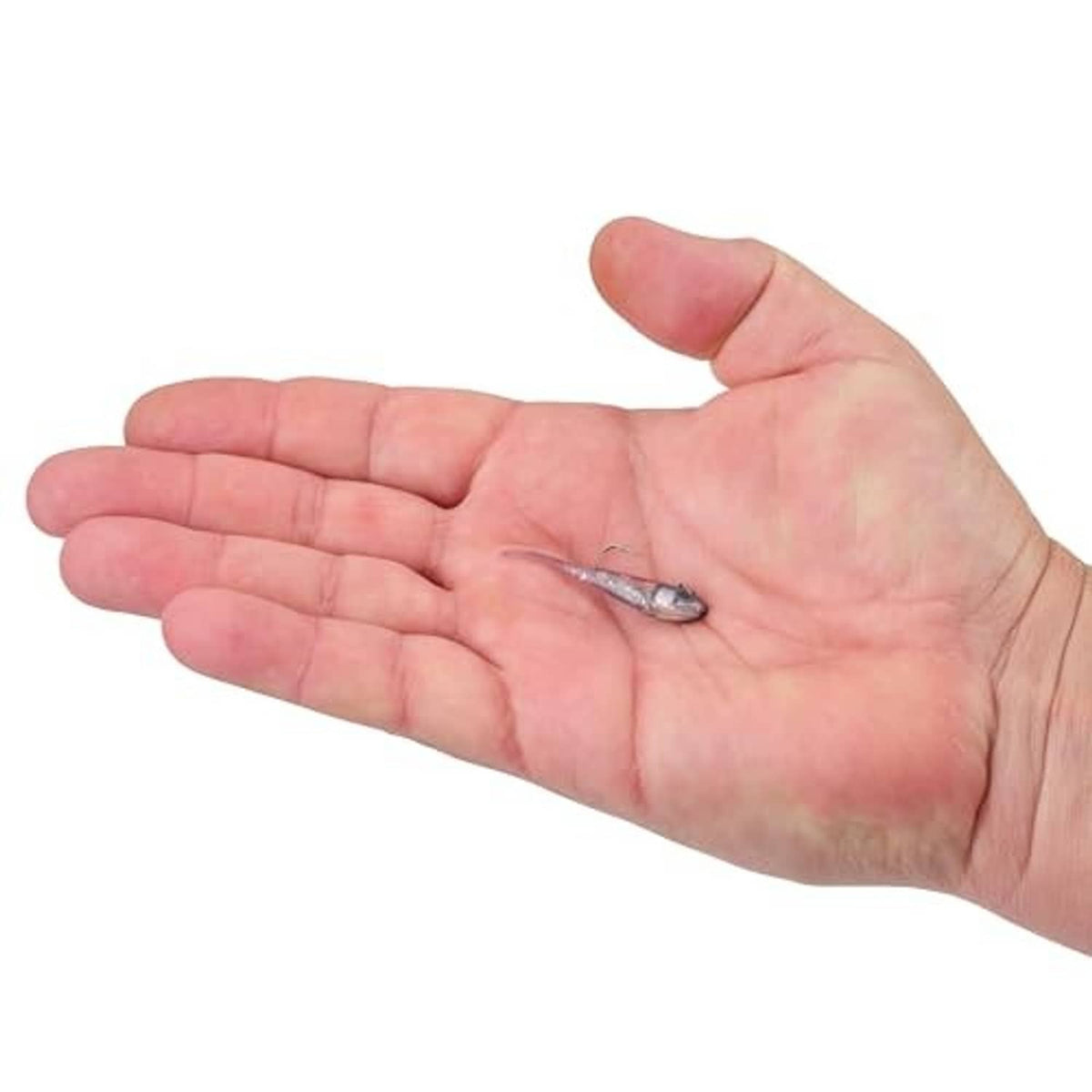 Purple wizard soft plastic fishing bait held in a hand, speckled body and hook