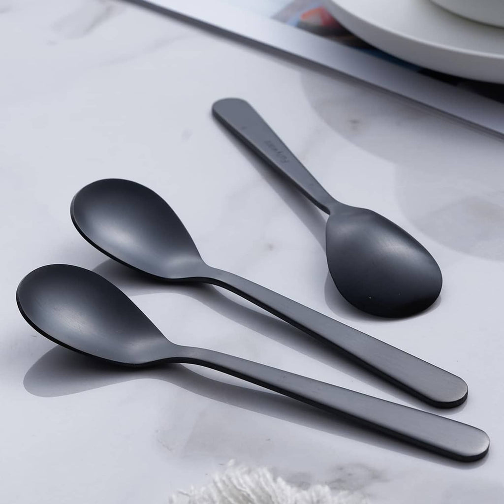 Matte black espresso spoons, satin finish, angled view of bowls and handles