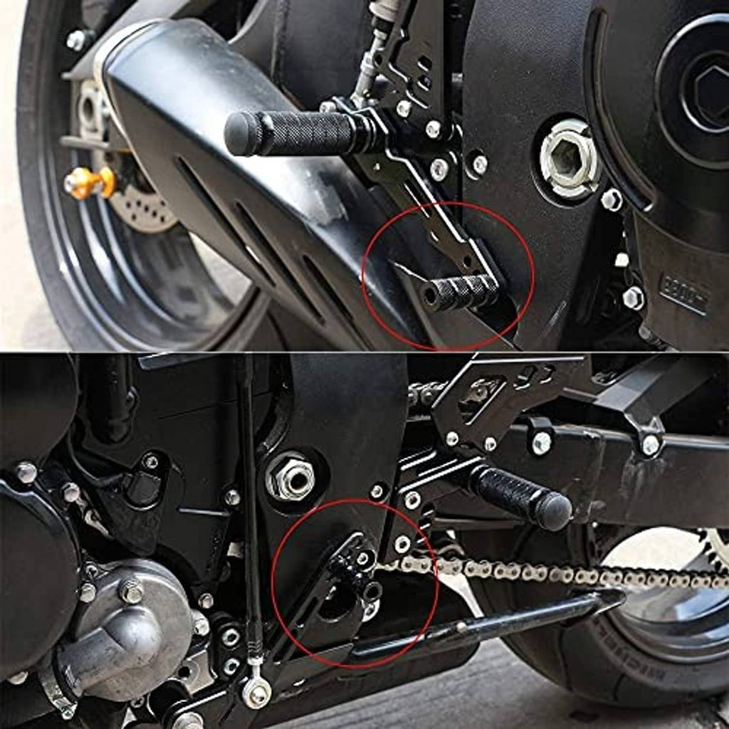 Black knurled foot pegs installed near the motorcycle shifter and brake lever