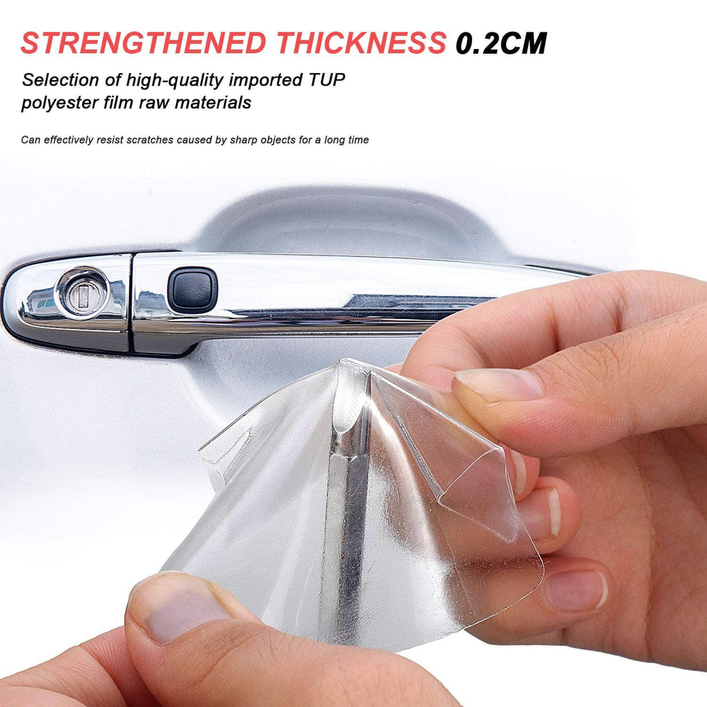 Hand applying clear car door handle cup protector film to a chrome handle