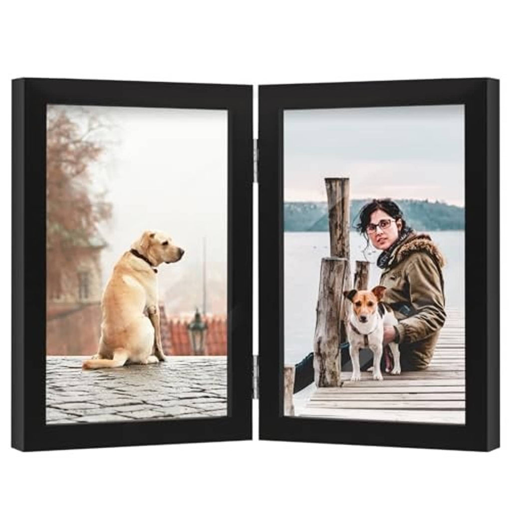 Black double hinged wooden photo frame with clear glass, front view with two photos