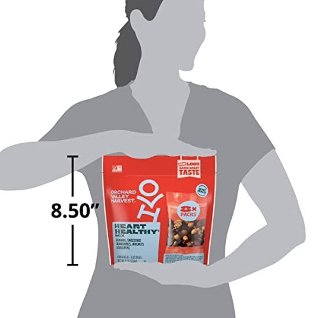Person holding a red Orchard Valley Harvest Heart Healthy Mix pouch, 8.50-inch size