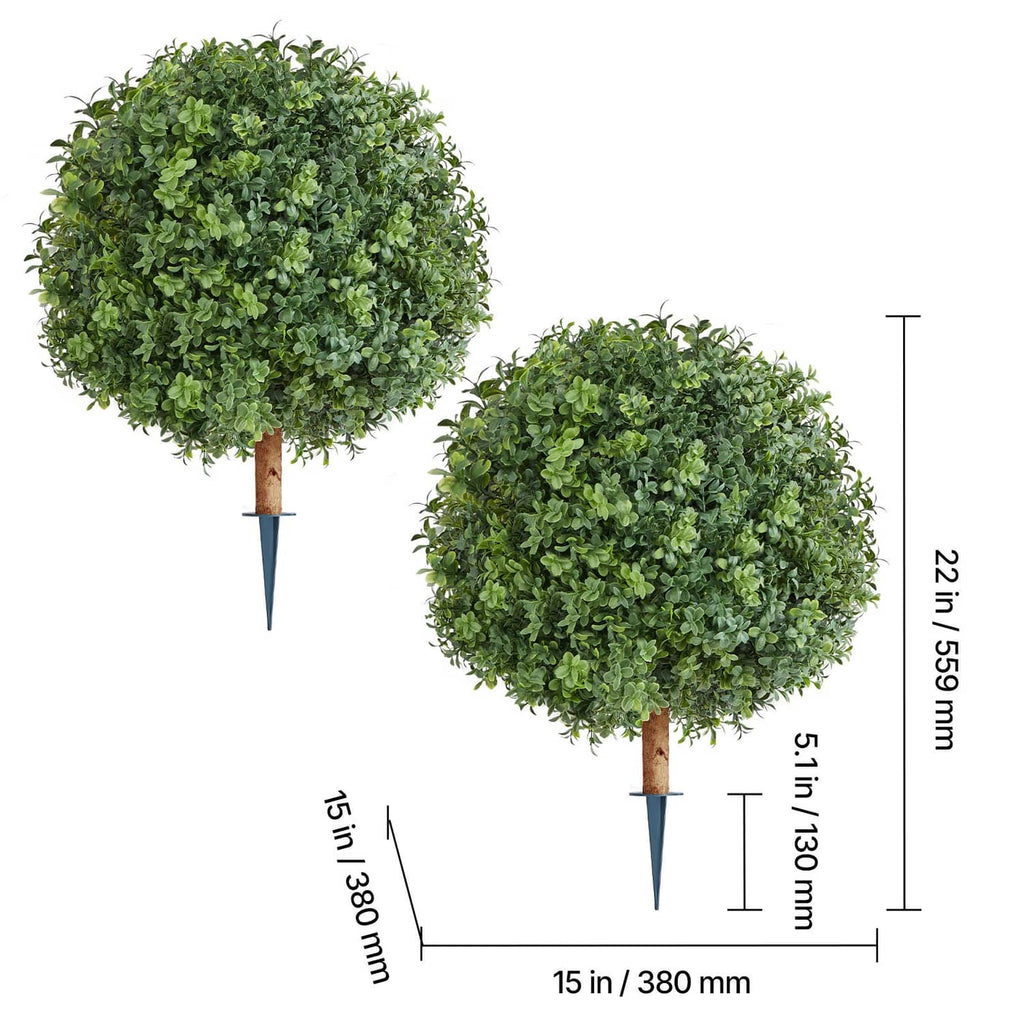 Two artificial topiary trees with rounded green foliage on brown trunks and spikes