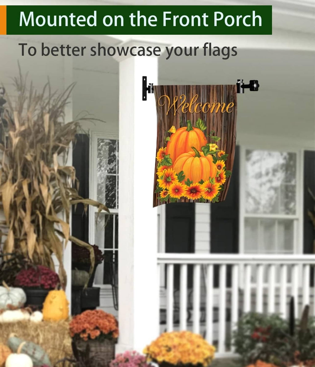 Black porch wall flag holder stand with push-button clips holding a pumpkin garden flag