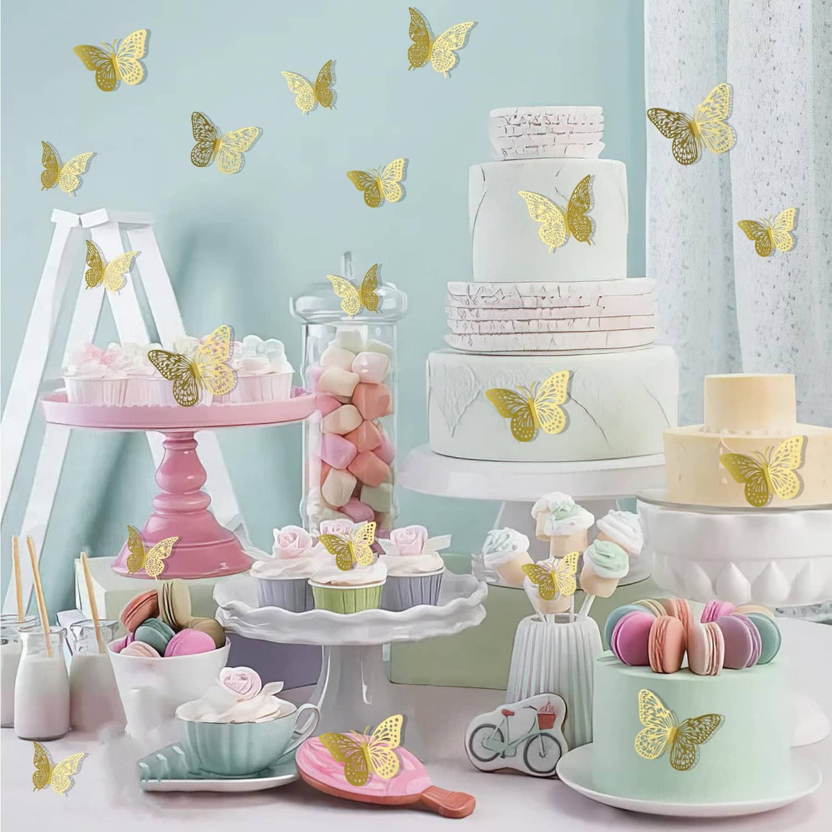 Gold 3D butterfly stickers used on party treats and cake stand displays