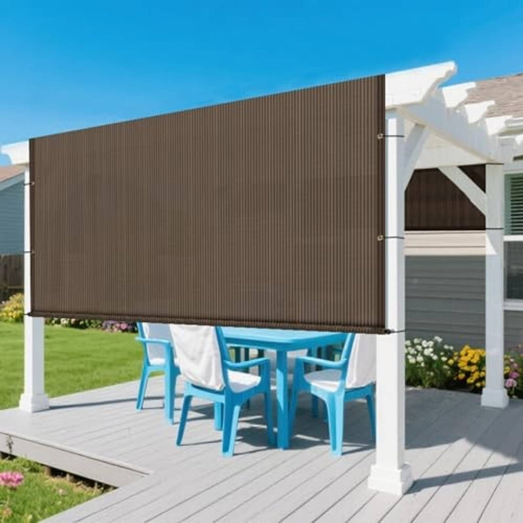 Brown retractable-style pergola shade panel cover with fabric valance and white posts