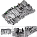 Transmission valve body with solenoids, silver-gray metal housing with green connectors
