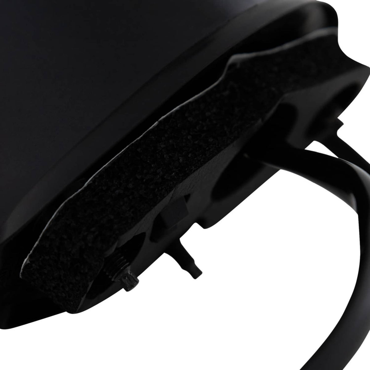 Black mirror housing underside with textured surface and mounting opening