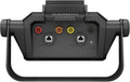 Garmin marine mount cradle with color-coded wiring ports on front panel, dark gray