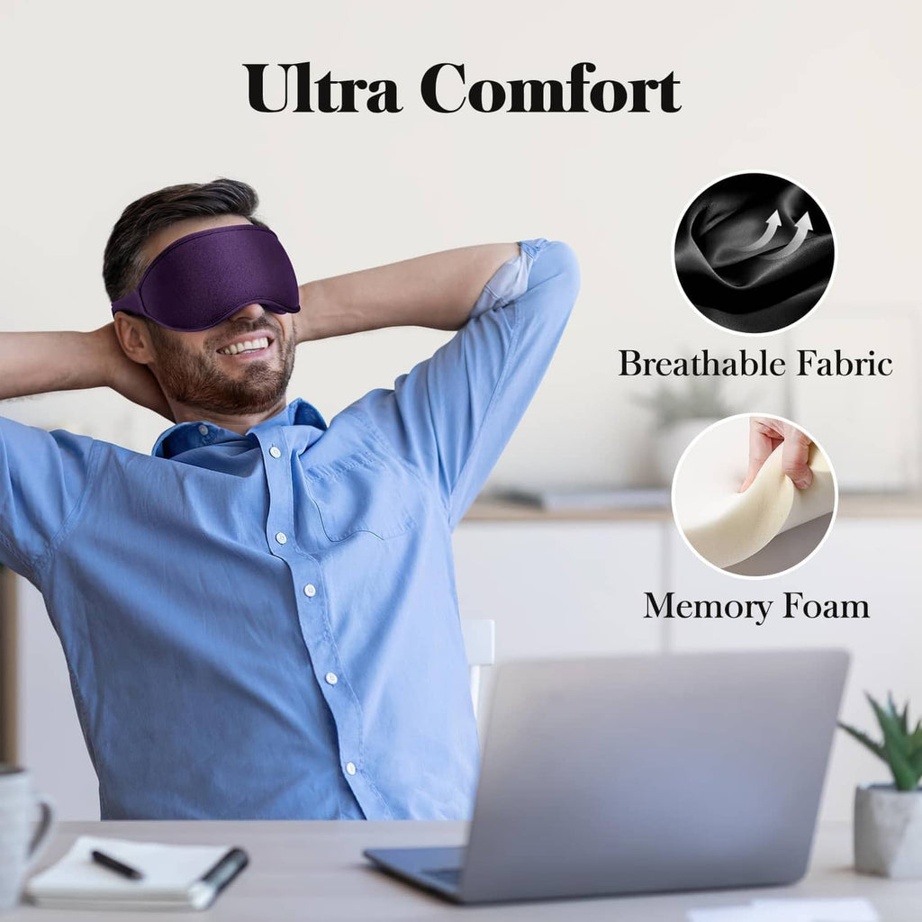 Purple 3D sleep eye mask worn on man, hands behind head