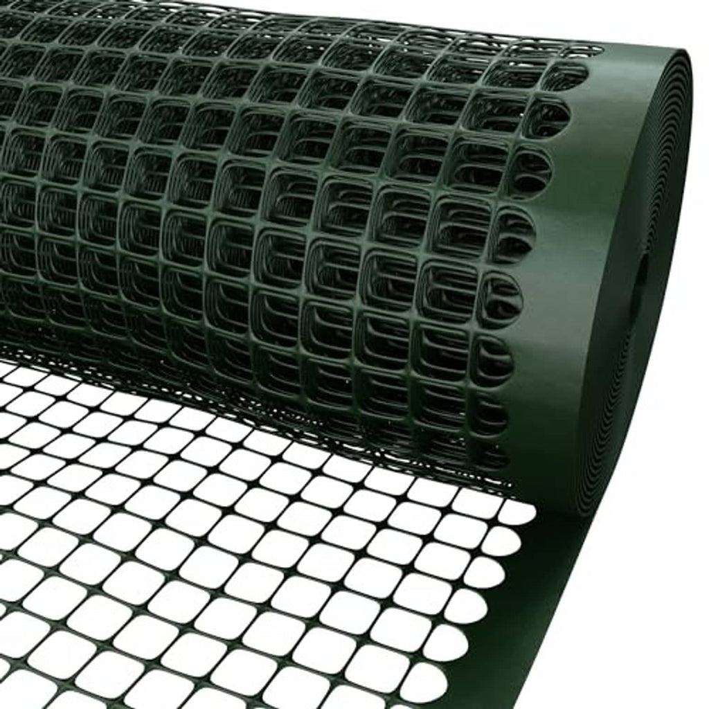 Green square-mesh plastic fence roll close-up showing dense grid and curled edge