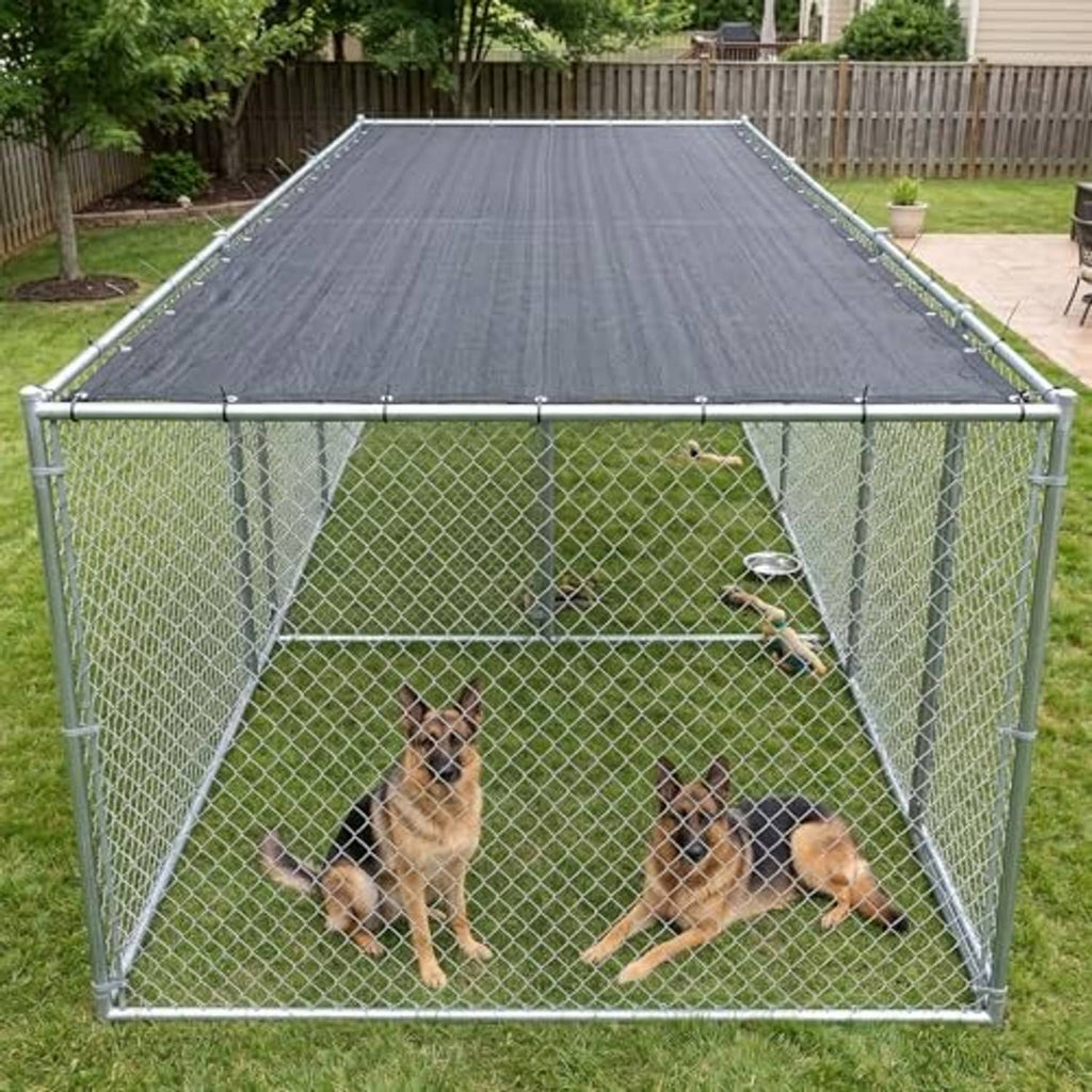 Dark fabric shade cover on large wire kennel enclosure with puppies inside