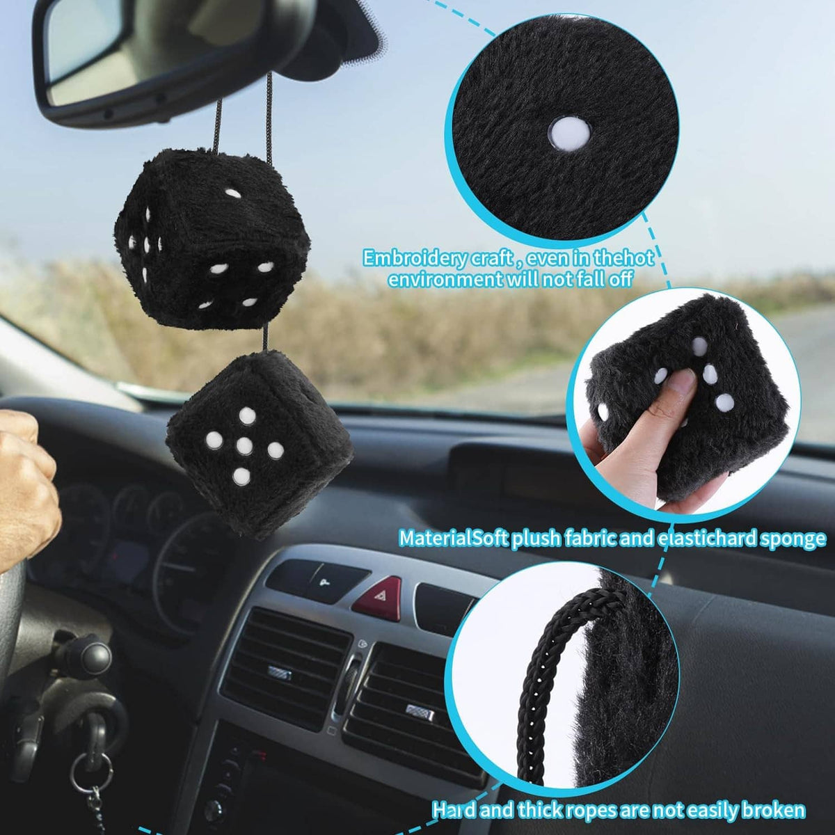 Pair of black fuzzy dice with white dots, hanging in car cabin from rear-view mirror