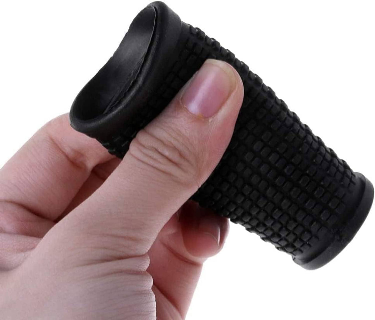 Black non-slip rubber handlebar grip held in hand, textured pattern and rounded ends
