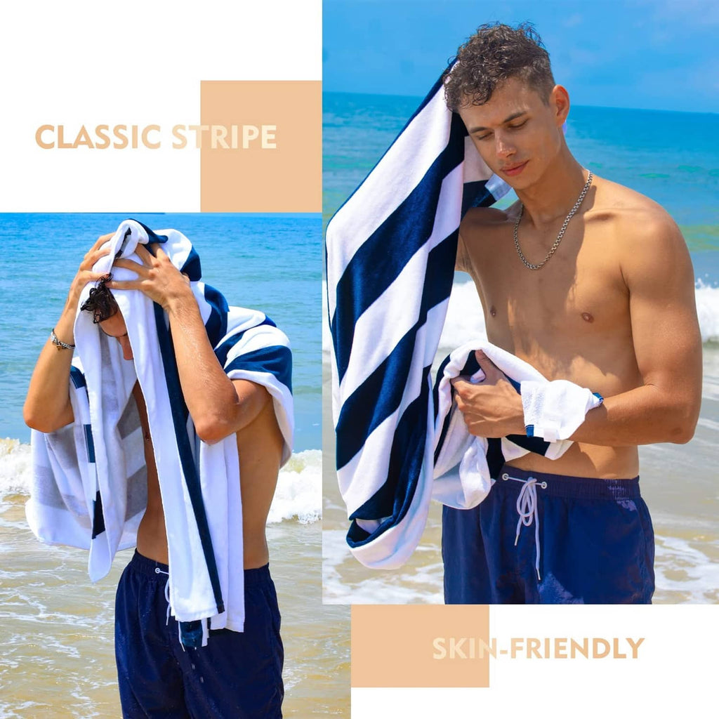 Blue and white striped cotton cabana towel, folded and held